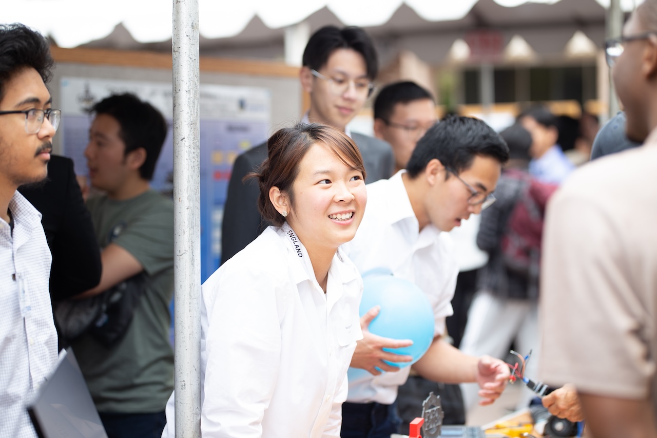 Capstone students at an exhibition