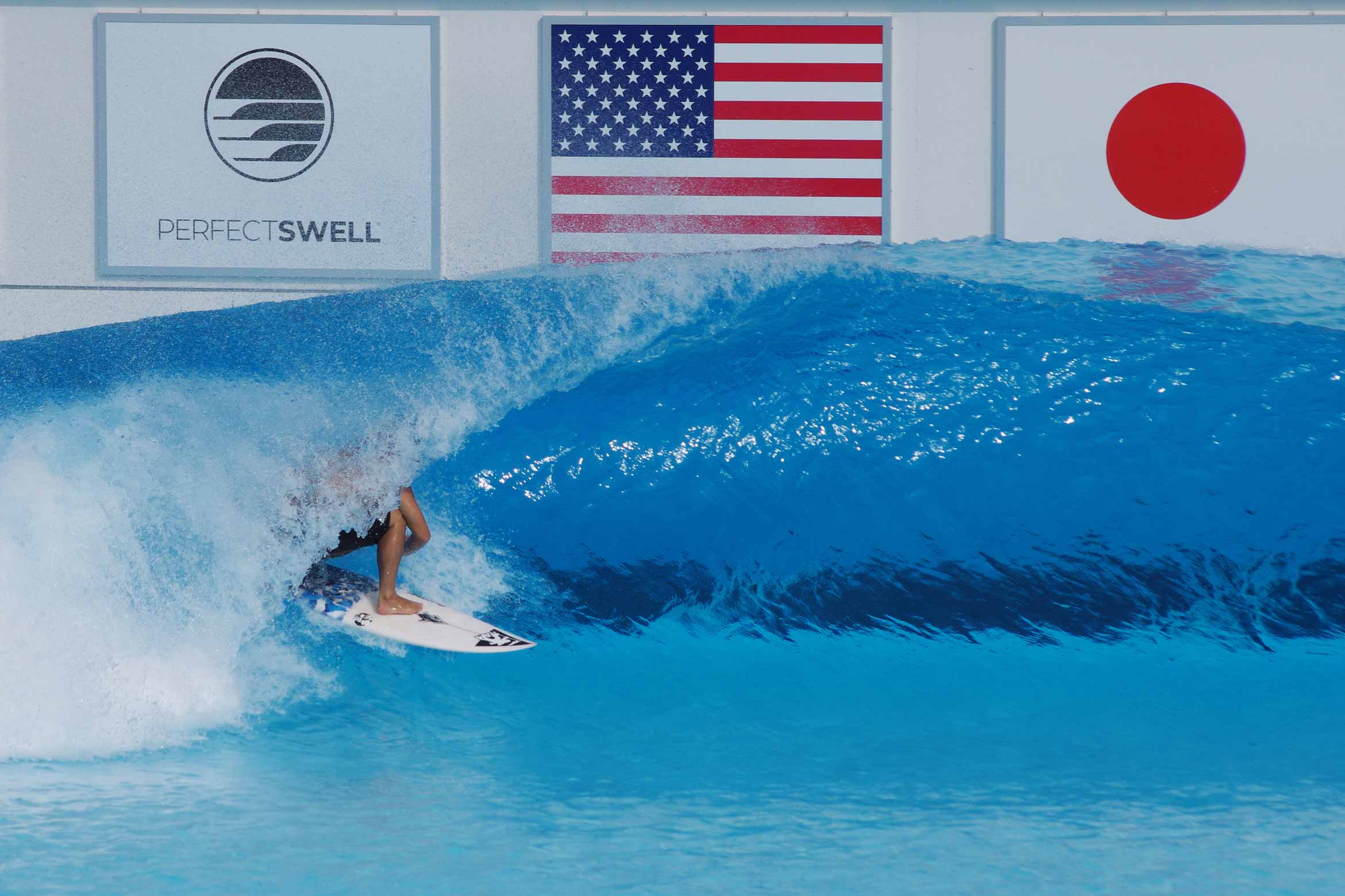 Masatoshi Ohno surfing on wave
